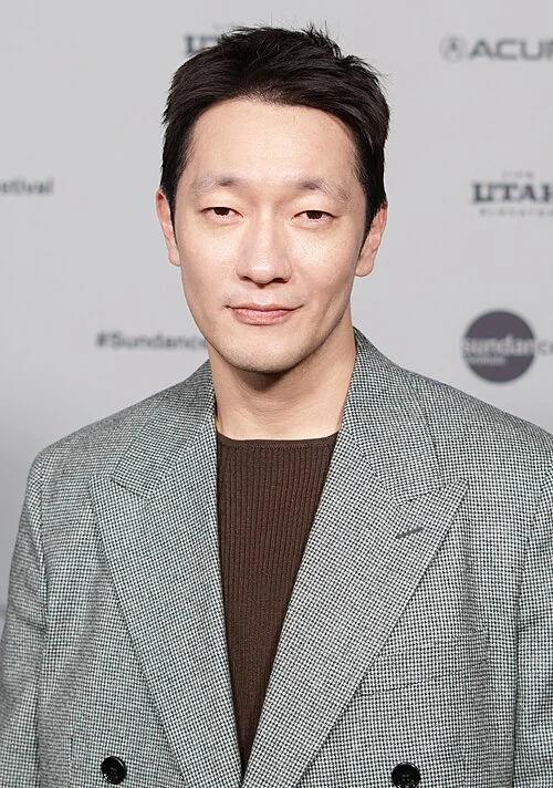Son Suk-ku at a public event
